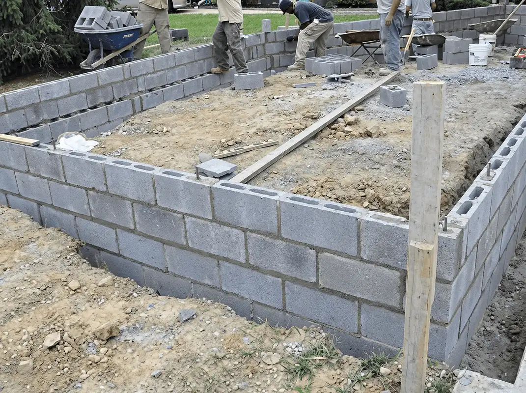Professionals building a foundation with blocks in Marietta, GA