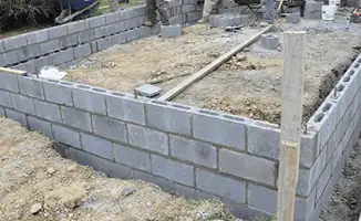 Professionals building a foundation with blocks in Marietta, GA