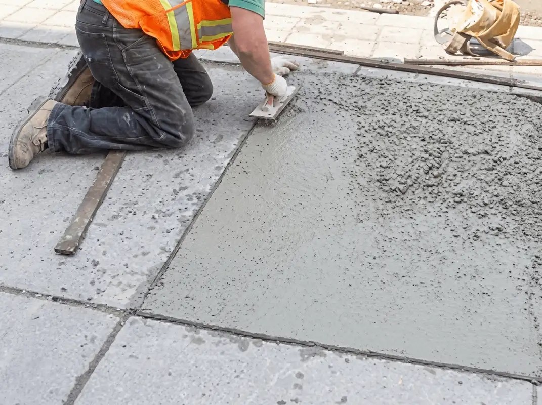 Professional repairing a concrete floor in Marietta, GA